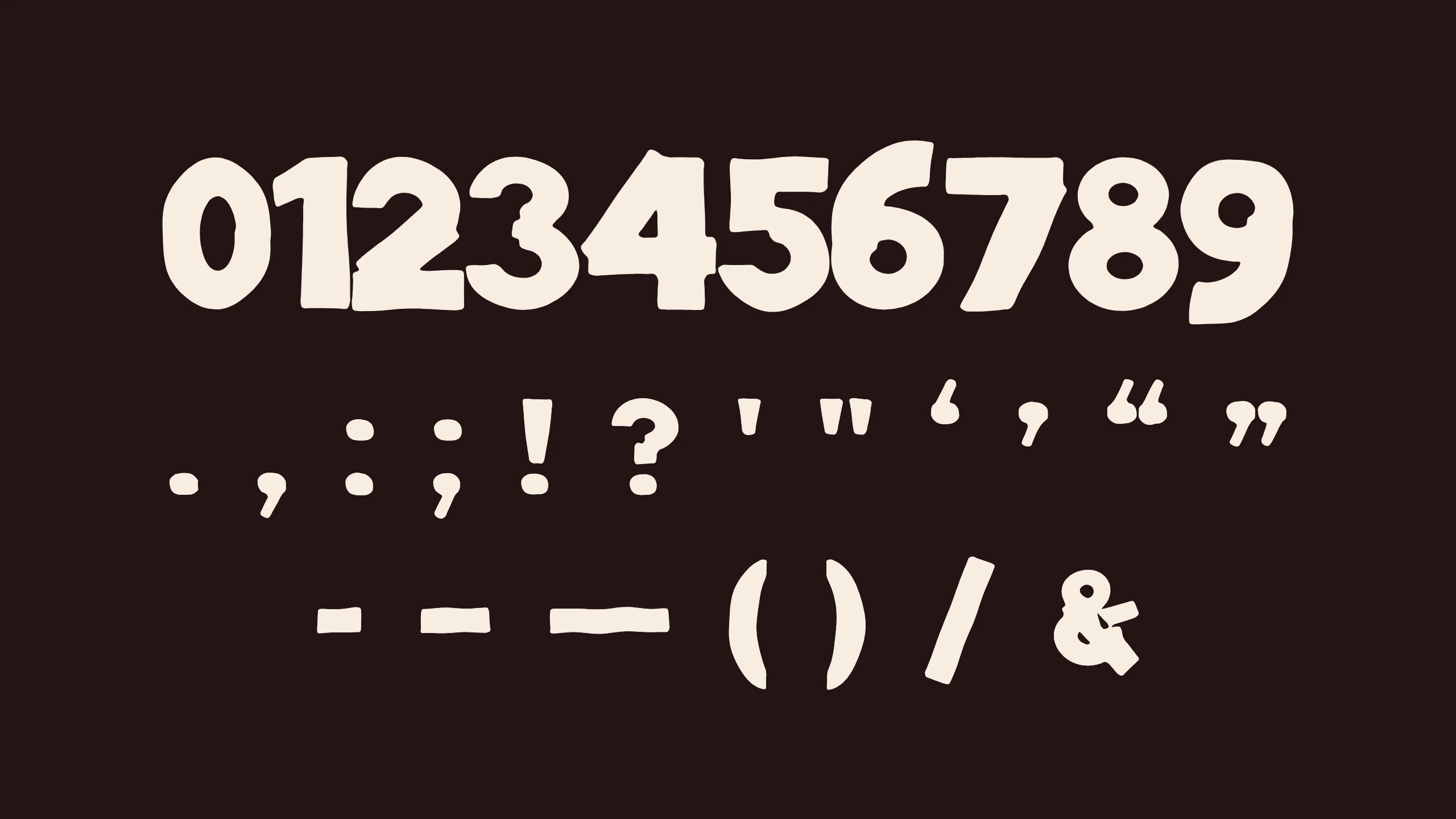 The ten numbers and the punctuation added to match the alphabet, in cream on dark brown